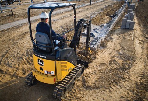 operator using a john deere 17d