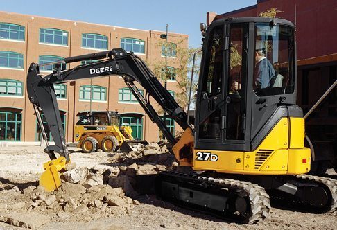 operator using john deere 27d