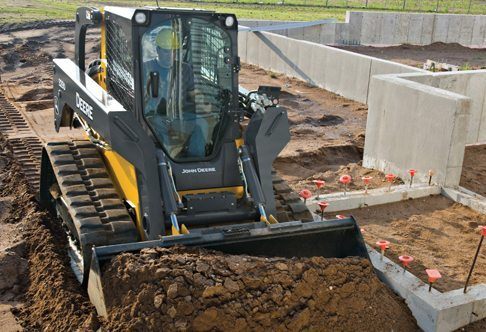 operator using john deere 329d