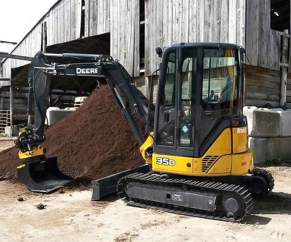 operator using john deere 35d